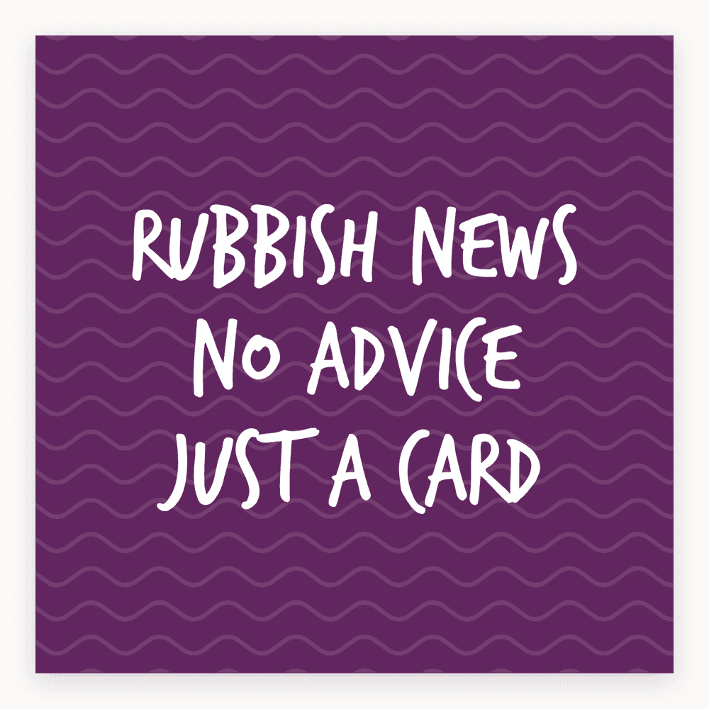 The card lying flat. Purple card with wavy patterns and the text 'Rubbish News, No Advice, Just a Card' in white.